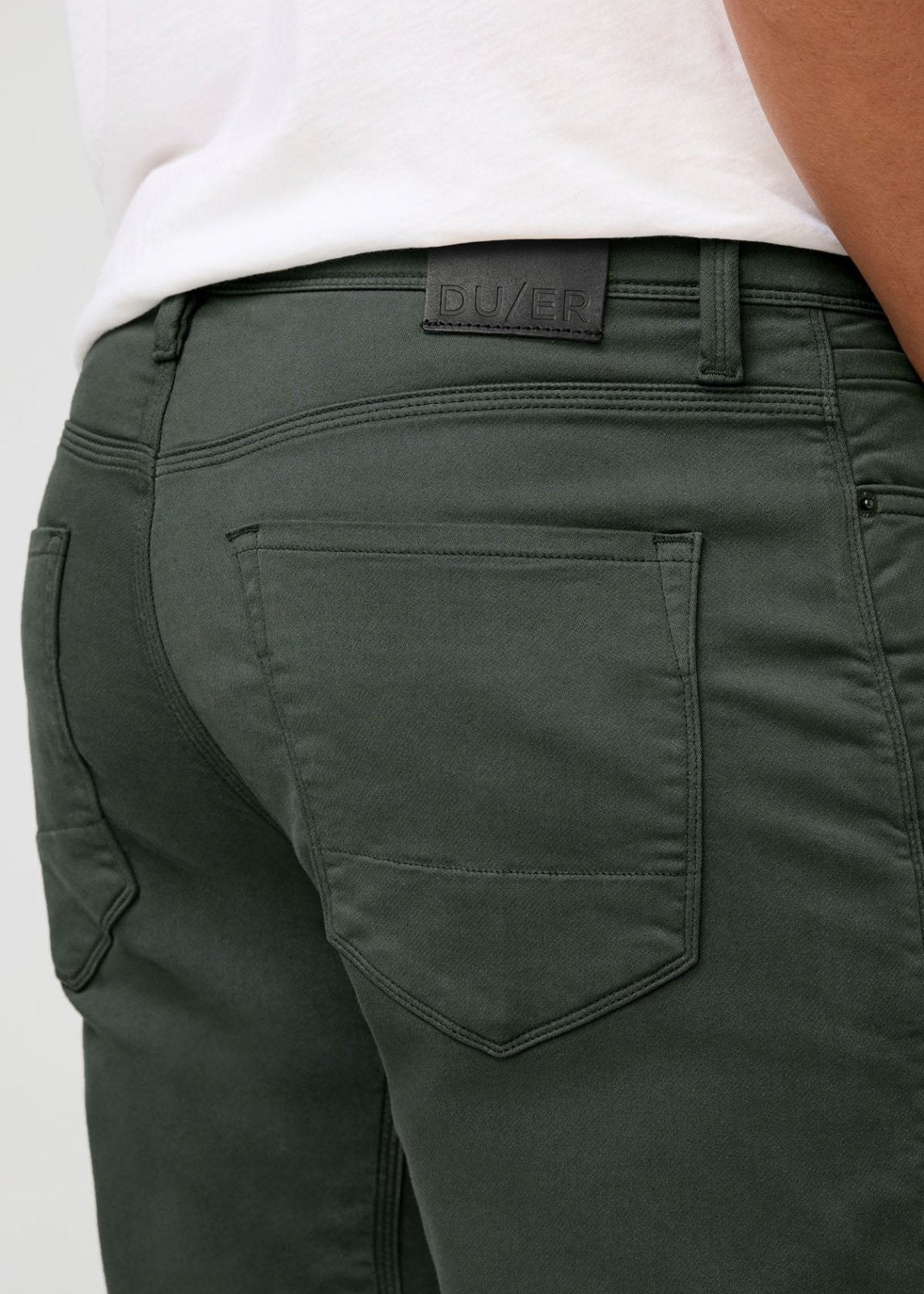 man wearing peat relaxed fit sweatpant back patch detail