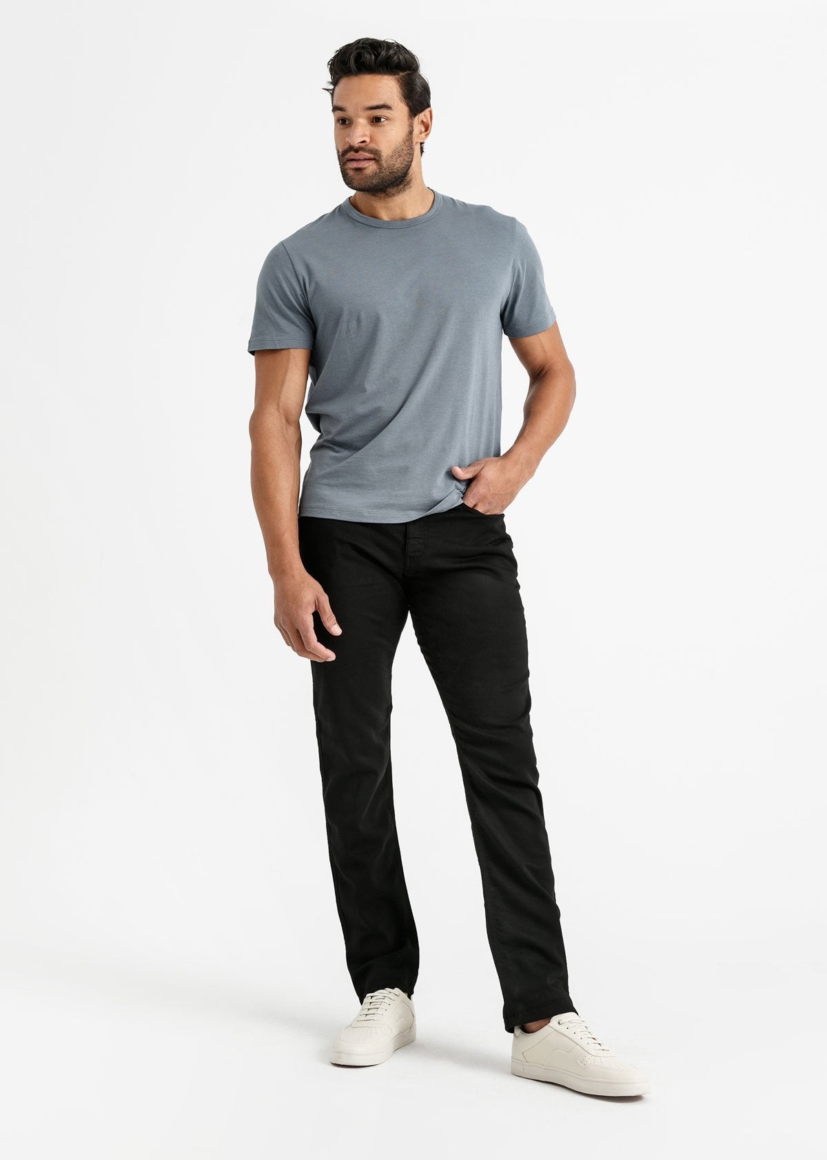 man wearing a black Relaxed Fit Sweatpant full body