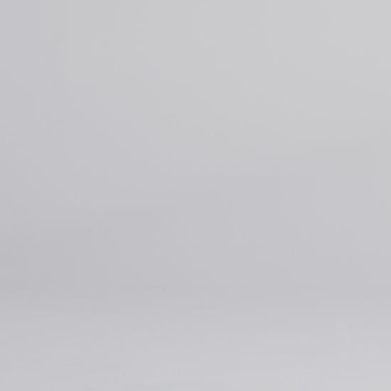 man wearing grey waterproof pants walking into frame, zipping the thigh pocket, adjusting the snap cuff, and stretching the thigh fabric